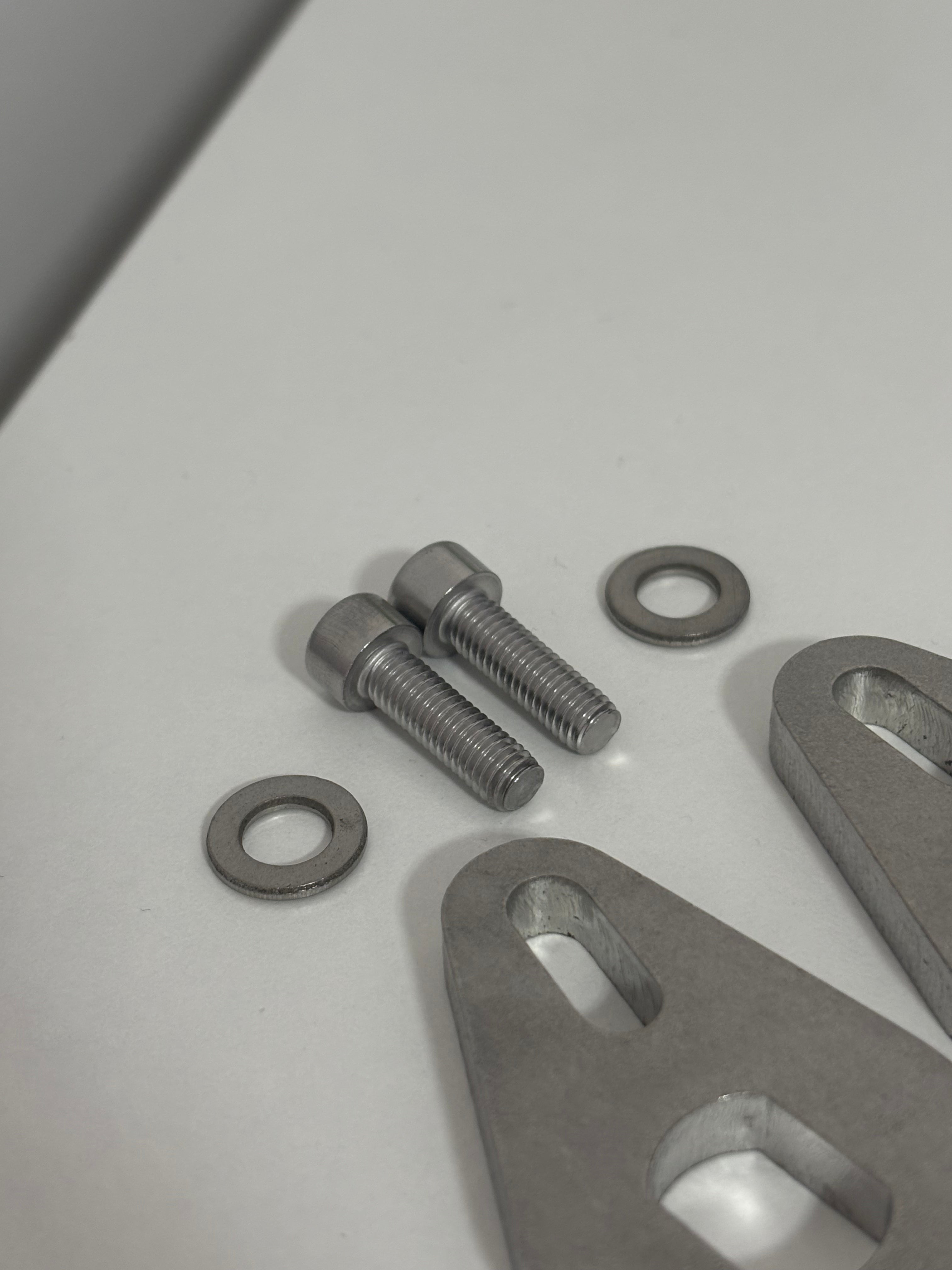 Steel torque arms