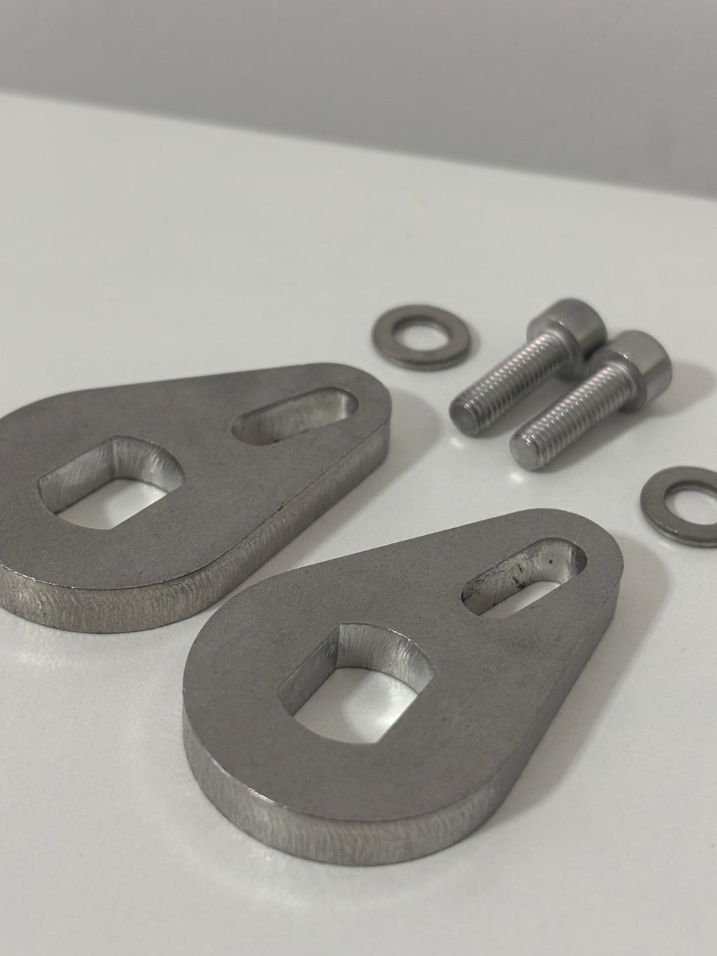 Steel torque arms